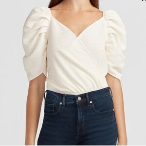 Express puff sleeves bodysuit